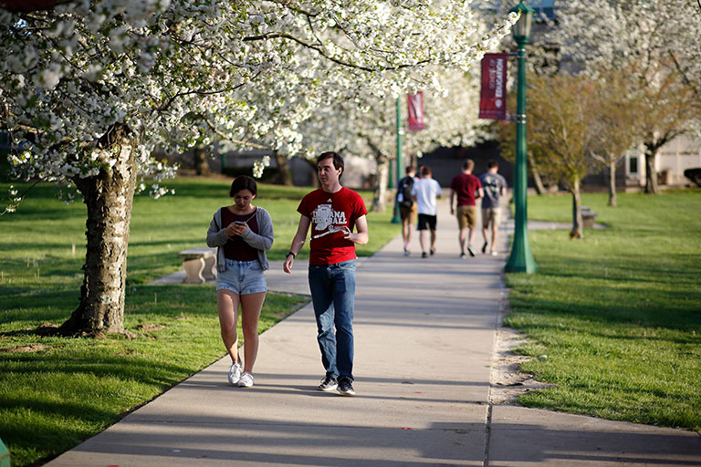 students-walking-by-soe-in-spring-768x512.jpg