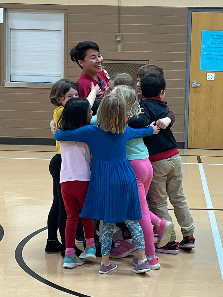 Rosamaria with her students at Rogers Elementary